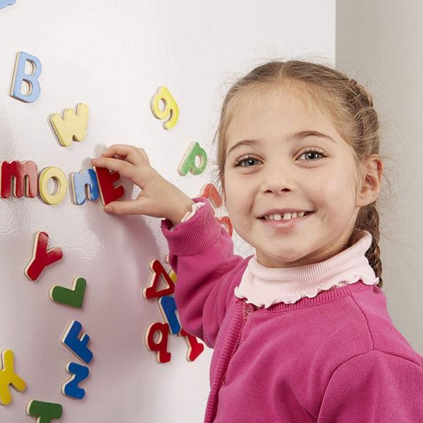 Girl with Alphabet Magnets